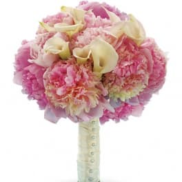 Pink bouquet with cream calla lilies and carnations wrapped in satin ribbon