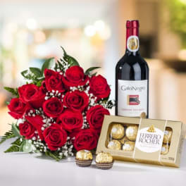 Red rose bouquet with a wine bottle and Ferrero Rocher chocolates