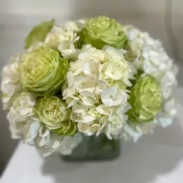 Bouquet of green and white flowers in a vase