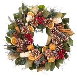 Holiday wreath with pinecones, dried orange slices, cinnamon sticks, and berries