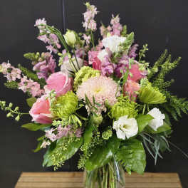 Pink and white mixed bouquet in a clear glass vase