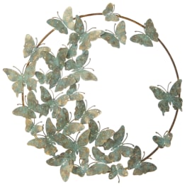 Butterfly wall wreath with teal and gold metal butterflies on a circular frame