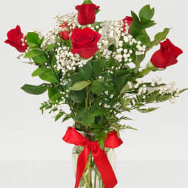 6 red roses in a vase
