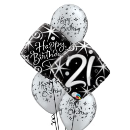 Cluster of black and silver birthday balloons with a "21" balloon