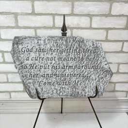 Decorative memorial plaque on a metal stand with a Bible verse
