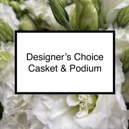 White and green floral arrangement with a text label