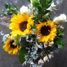 Bouquet with sunflowers, white roses, and greenery