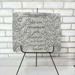 Decorative memorial plaque on a metal easel with a daughter tribute message