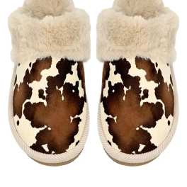 Pair of fuzzy cow-print slippers with cream faux-fur cuffs