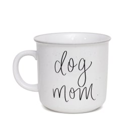 White mug with the words "dog mom" in black script