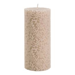 Cream-colored pillar candle with a floral cutout pattern