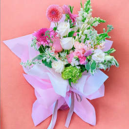 Pink flowers with glass vase bouquet