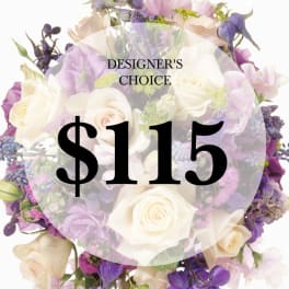Mixed bouquet of white, lavender, and purple flowers with a $115 label