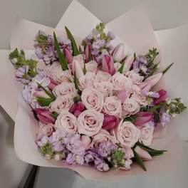 Pink and purples tulips and roses. Pastel mix
