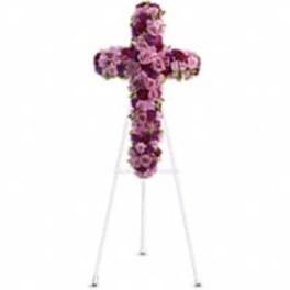 Purple floral cross on a white easel