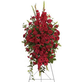 Tall red floral standing spray on an easel