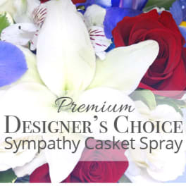 Sympathy casket spray with white lilies and red roses