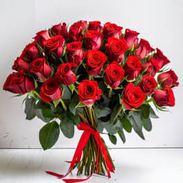 Bouquet of red roses tied with a red ribbon