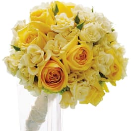 Yellow and white rose bouquet with a white ribbon handle
