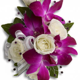 White roses with purple orchids and silver ribbon accents
