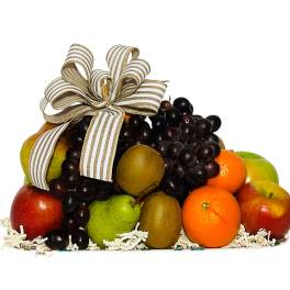 Fruit basket with grapes, apples, pears, and oranges topped by a striped ribbon bow