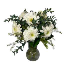 White daisy bouquet in a dark glass vase