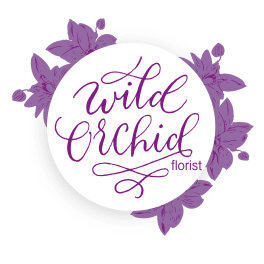 Purple floral logo with the words Wild Orchid florist