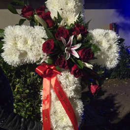 Standing floral spray with white chrysanthemums and red roses