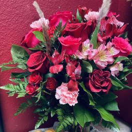 Red rose bouquet with pink alstroemeria and carnations, plus macarons and chocolate-covered strawberries