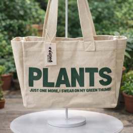 Canvas tote bag with the word PLANTS printed on it