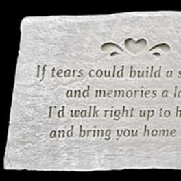 White memorial plaque with an engraved sympathy poem