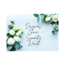 White roses with eucalyptus around sympathy wreath text