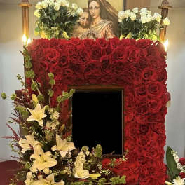 Large red rose floral frame with white lilies and a central photo opening