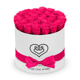 Round box of hot pink roses with a satin ribbon