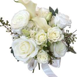 White rose and calla lily bouquet with a satin ribbon