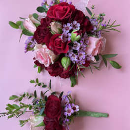 Two small floral bouquets with red and pink roses on a pink background