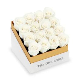 Box of white roses in a gold-trimmed gift box