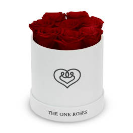 Red roses arranged in a white round box with a heart logo