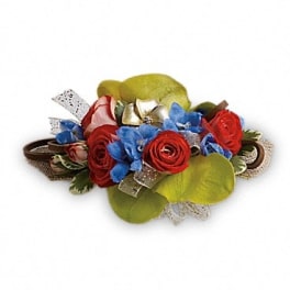 Small bouquet of red roses and blue flowers with ribbon accents