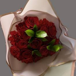 PAPER WRAPPED ROSES AND CARNATIONS