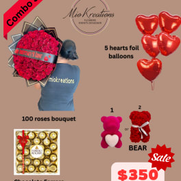 Red rose bouquet with heart balloons, teddy bear, and chocolates