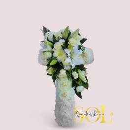 White floral standing spray with lilies and roses