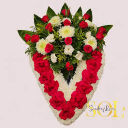 Heart-shaped floral spray with red roses and white chrysanthemums