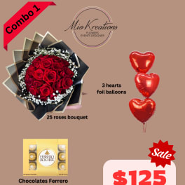 Red rose bouquet with baby’s breath beside heart-shaped balloons and chocolates