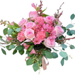 Pink rose bouquet with eucalyptus and small filler flowers