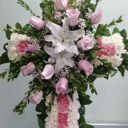 Standing floral spray with pink roses, white lilies, and carnations