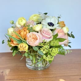 Mixed pastel bouquet in a clear glass vase