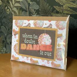 Decorative card with the words "when in doubt DANCE it out"