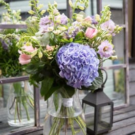 Lavender and pink bouquet in a clear glass vase