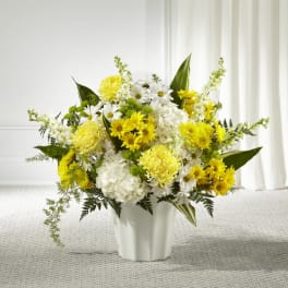Yellow and white mixed bouquet in a white vase